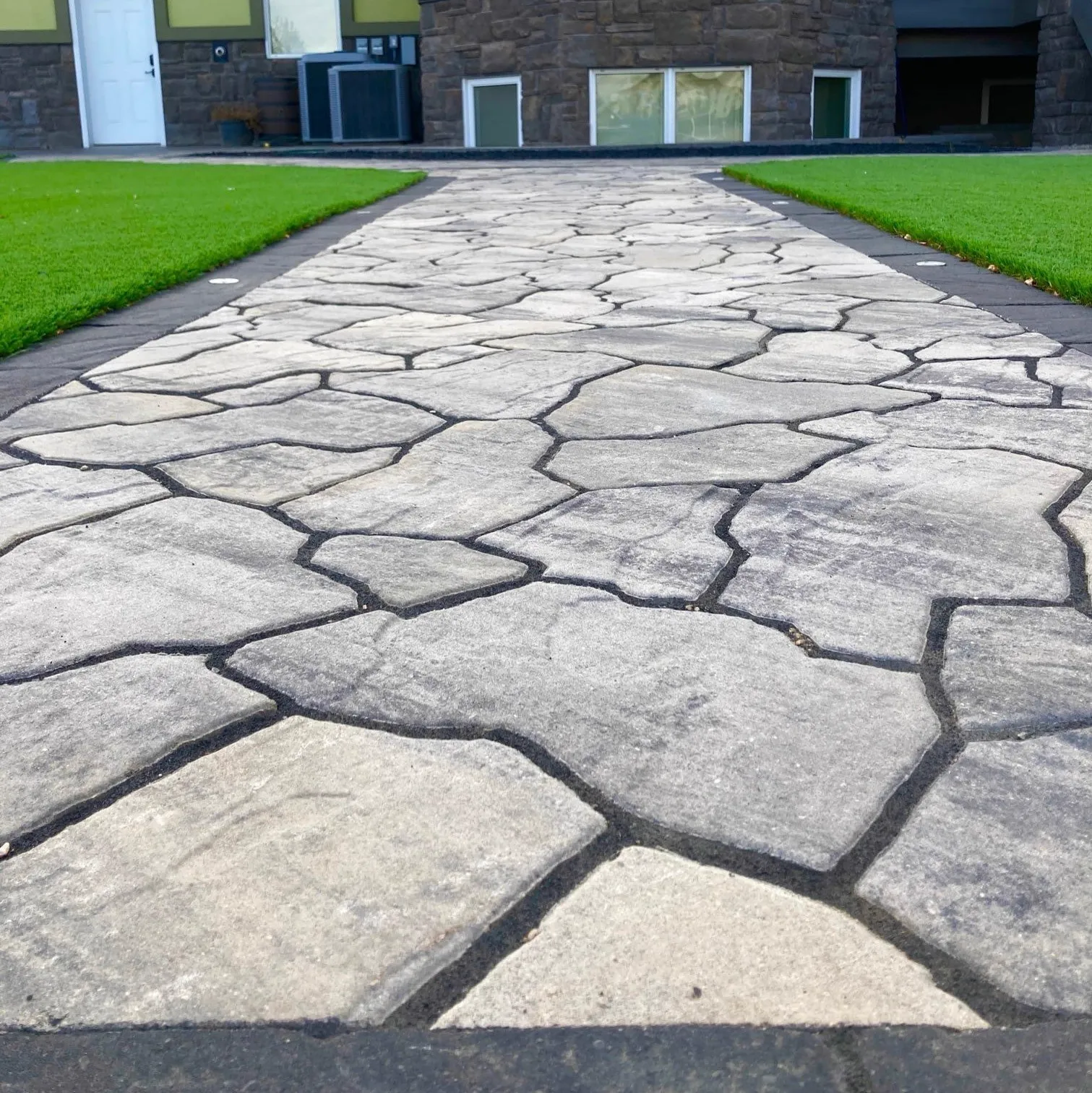 Custom paver walkway built by Brick Lawn Landscaping