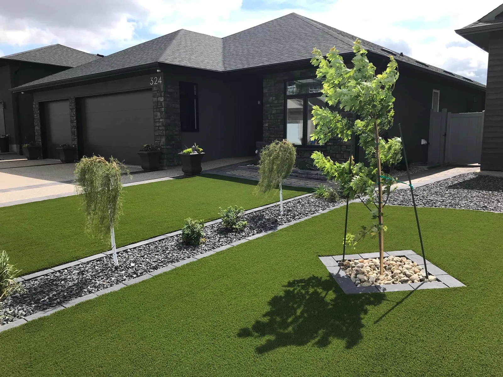 Contoured turf and paver bands